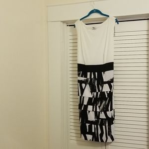 Dress with tie back black belt. 95% poly, 5%spande